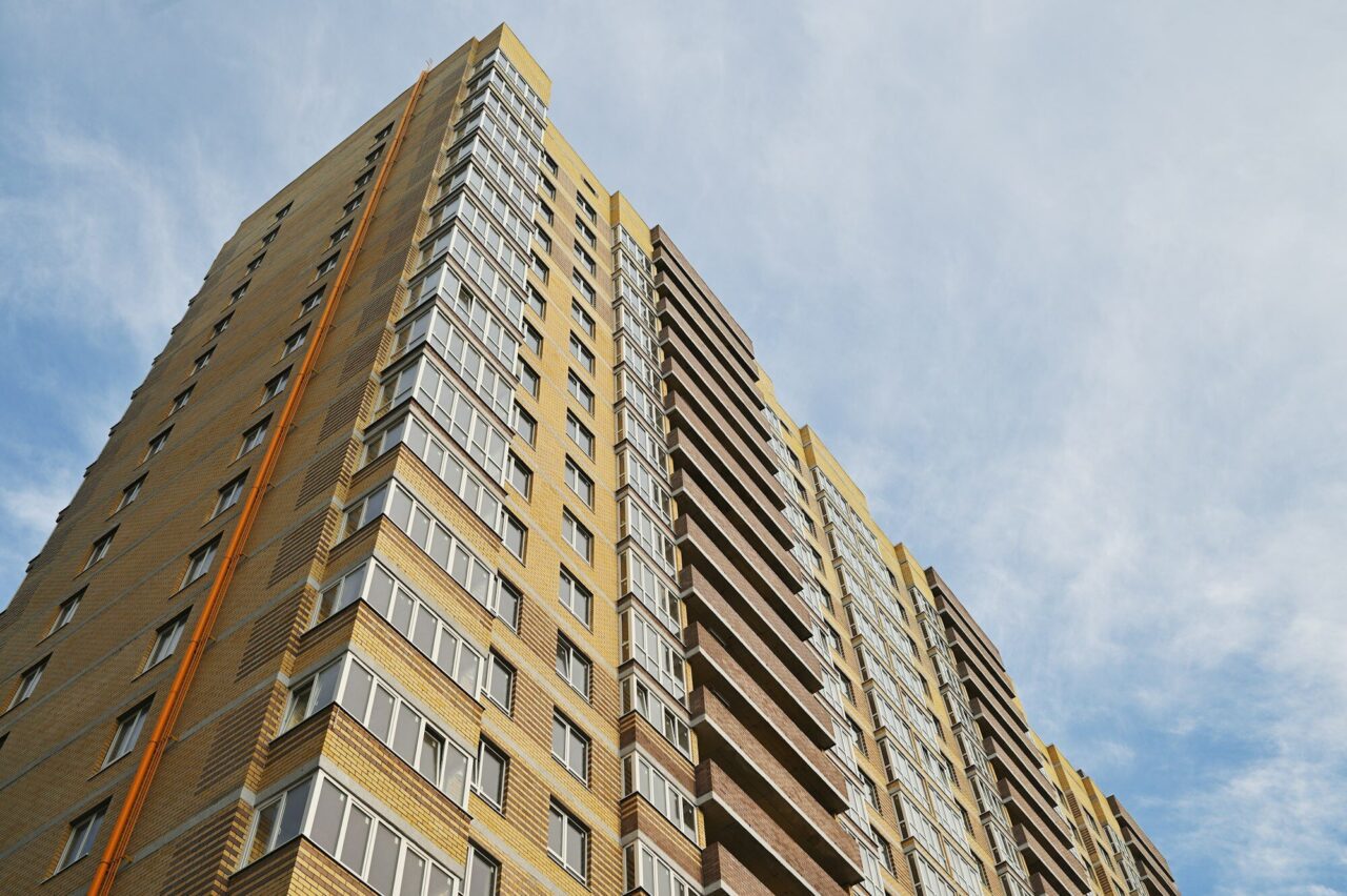 New Yellow Brick House Against The Blue Sky Mortgage Real Estate New Housing Copy Space